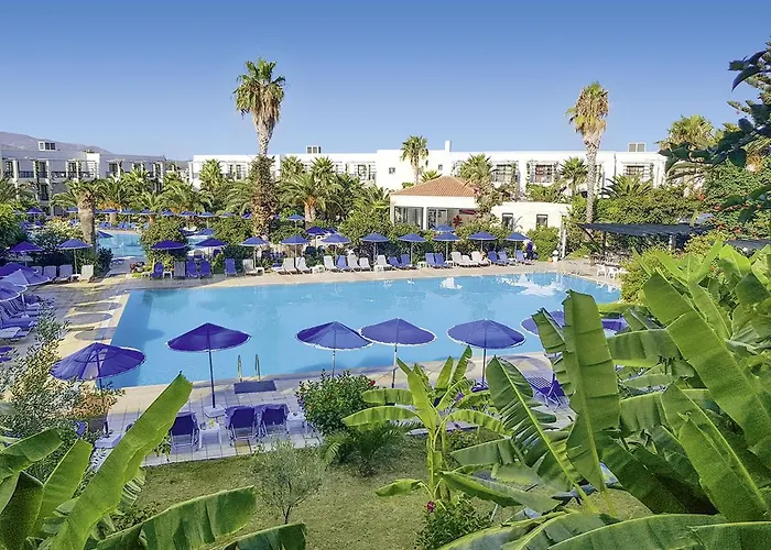 Отель Tigaki Beach Hotel Тигаки