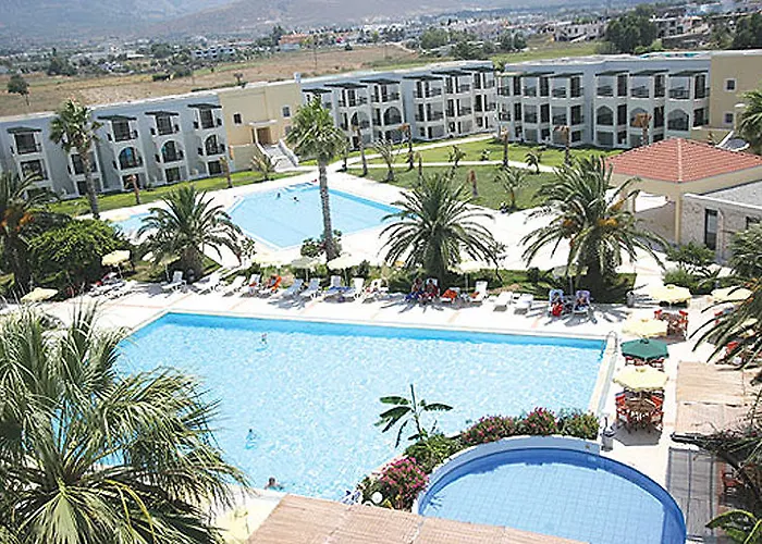 Отель Tigaki Beach Hotel Тигаки